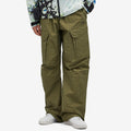 Nike Men's Nocta Open Hem Pant in Medium Olive