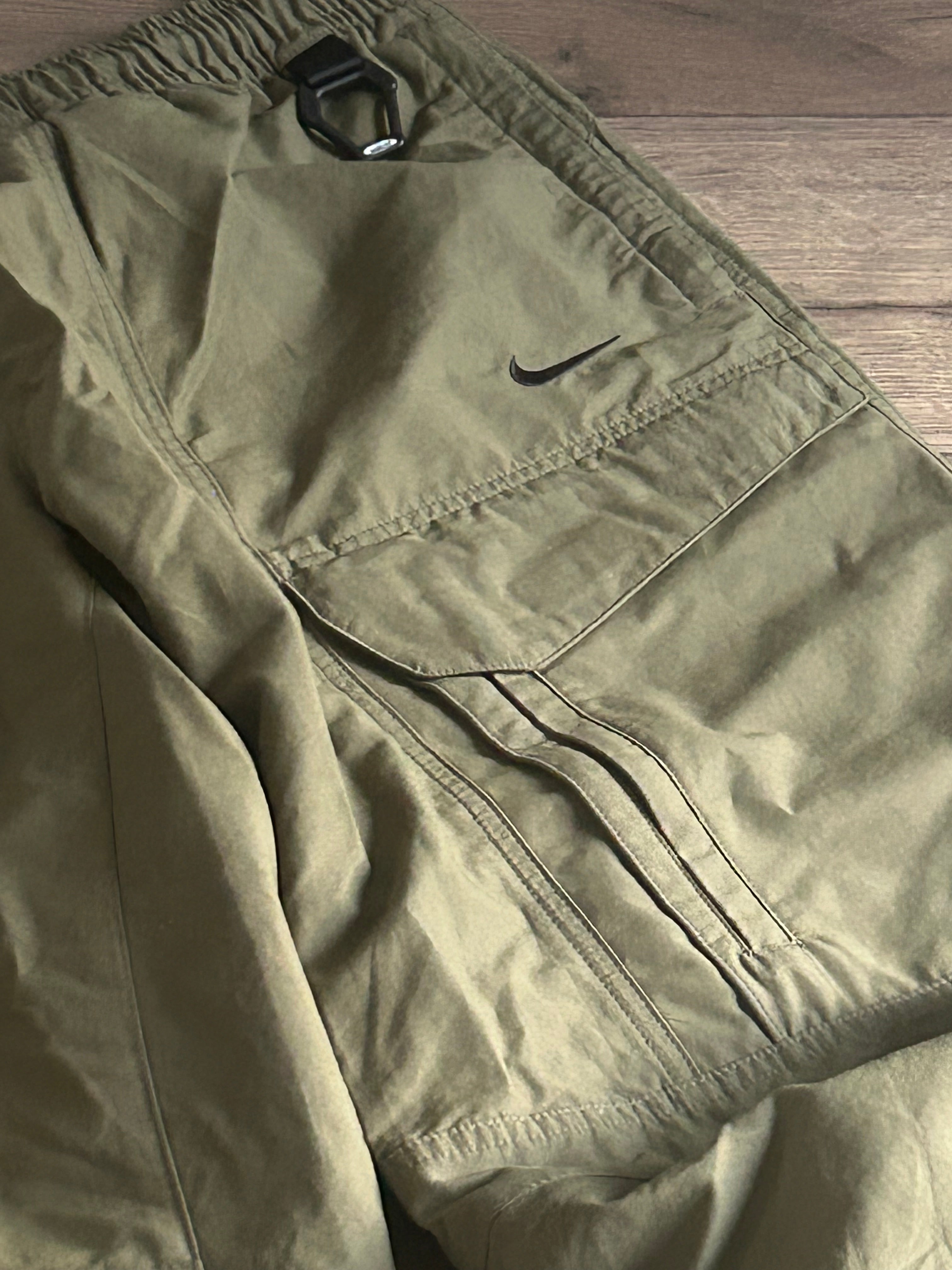Nike Men's Nocta Open Hem Pant in Medium Olive
