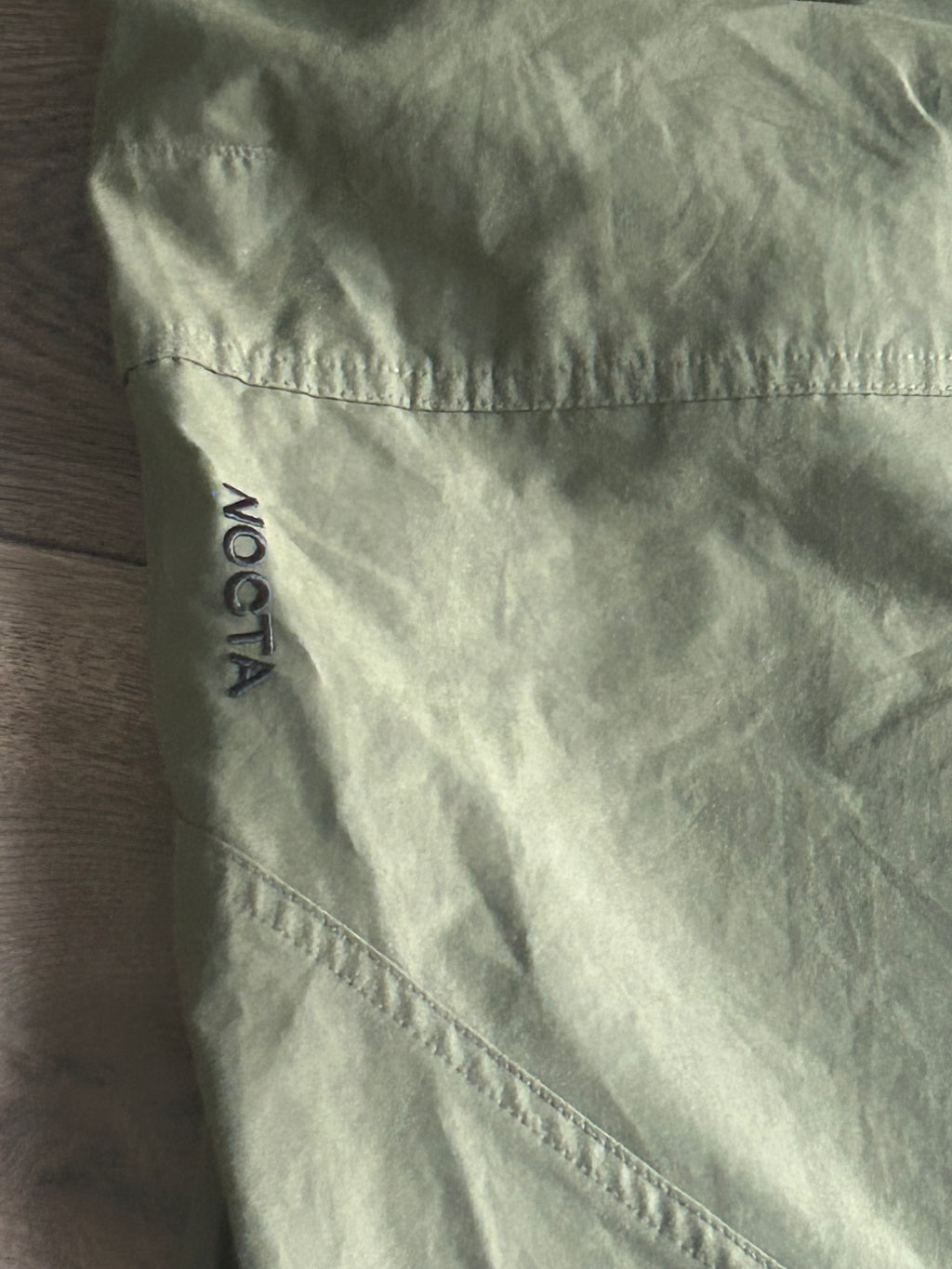 Nike Men's Nocta Open Hem Pant in Medium Olive